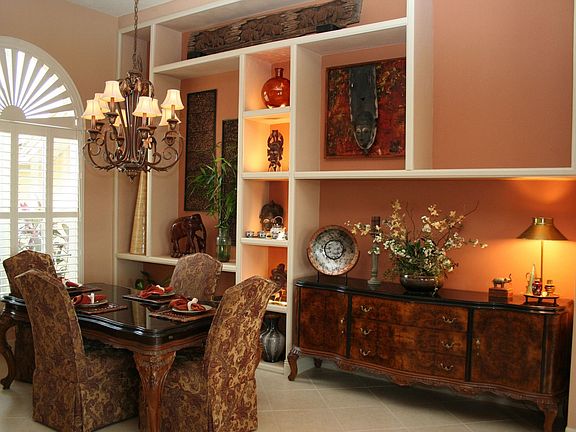 Formal Dining Room with Tray Ceiling and Gallery Display