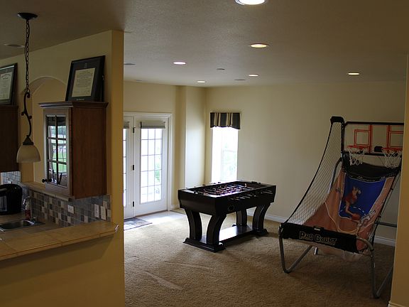 Gameroom with cutout to TV