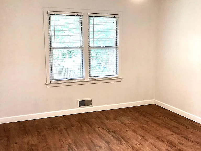 Bedroom #2 with window blinds. Fits a King or Queen bed. New modern ceiling fan with LED light with dimmer and variable speed fan.