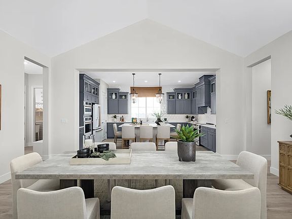 Dining area with vaulted ceiling