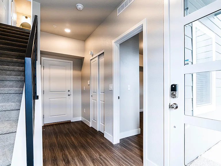 Entryway (1st floor): stairs to main level, 2-car garage, closet, office, porch (with keypad entry)