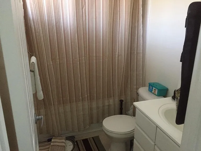 Main Bath (Attached to BR #2) Imagine checking all of your e-mails, social media, and news mounted upon this throne!