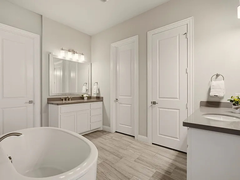 Ensuite with Two Vanities and Soaking Tub.