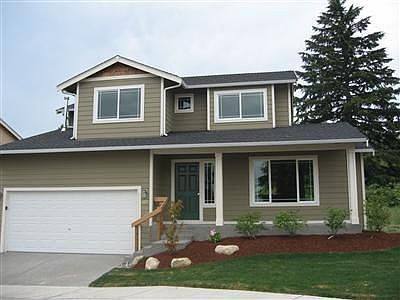 Photos from similar home on different lot in same development
