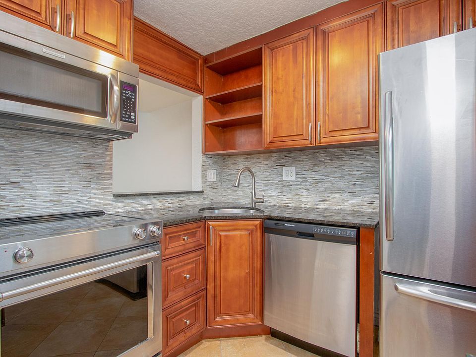 Modern kitchen with new high-end appliances.