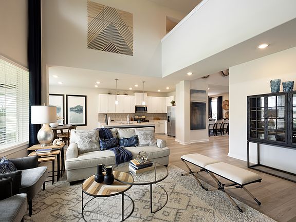 HOU_KingdomHeights_L542_Andes_5515 Kingdom Heights Blvd_Living Room Kitchen Dining Room_Model.jpg