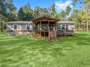 577 Winding River Rd S, Oakhurst, TX 77359