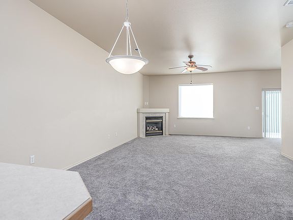 View from kitchen to living room and dining area