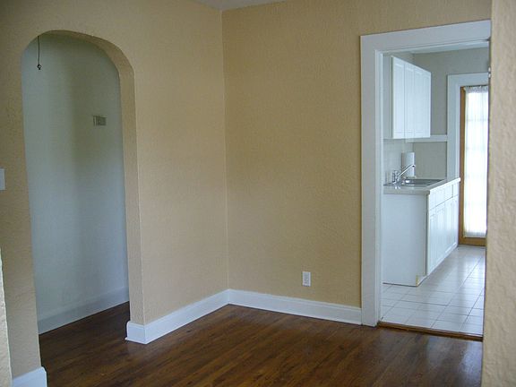 Arched doorway to bedrooms