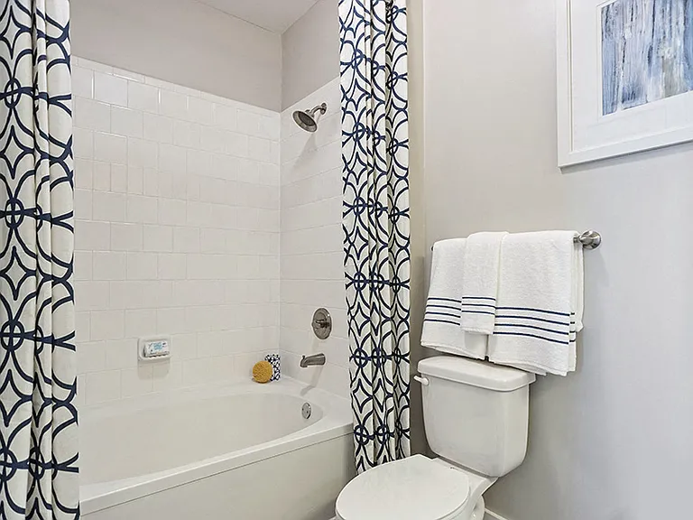 Bathrooms with tile surround showers and tubs