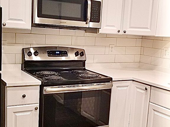 New range, microwave, refrigerator