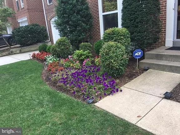 Edgemere front and right yard