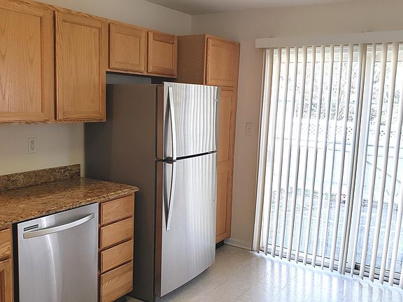 UPDATED KITCHEN WITH GRANITE COUNTERS AND SS APPLIANCES