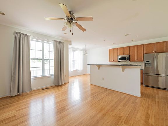 second floor living room and kitchen area