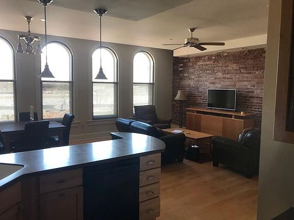 Kitchen/Living area with exposed brick