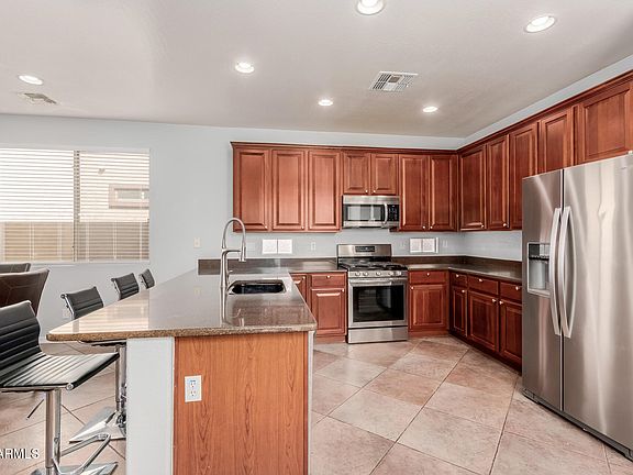 5th image of 16022 W DESERT MIRAGE Drive