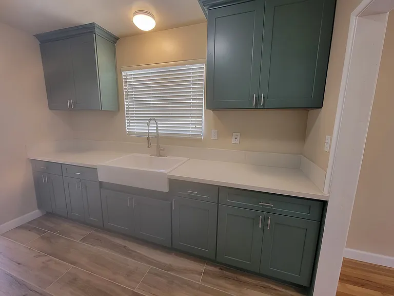 New kitchen sink and cabinets.