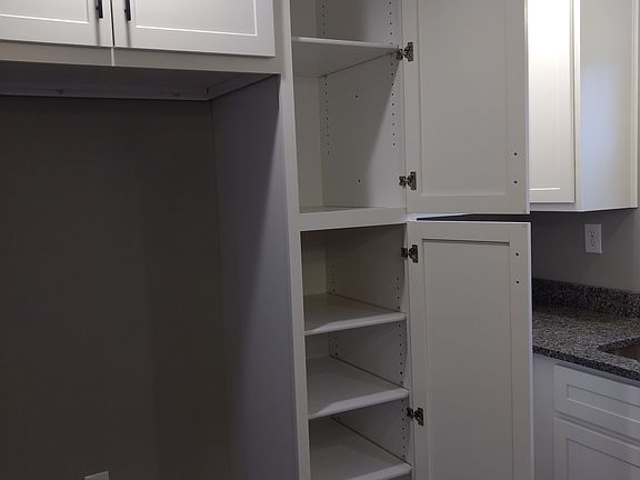 Adjustable shelves in pantry