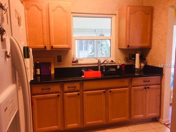 Nice updated kitchen that looks out to lanai
