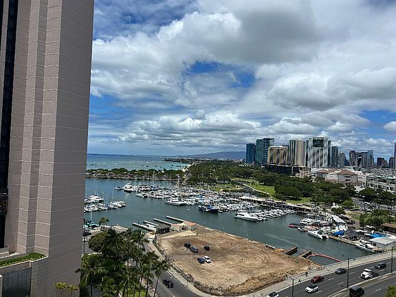 View of Ala Moana Beach Park and part of Ala Moana Shopping center taken from the Oceanside Patio .