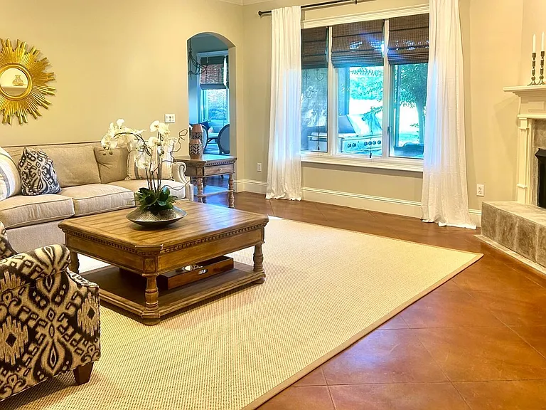 Fireplace in Den, views to screen porch