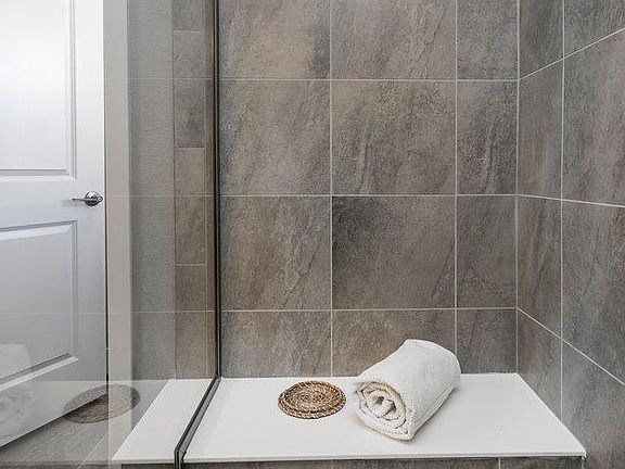 Master bathroom sit in shower