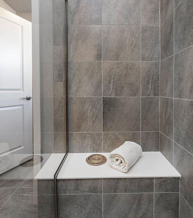 Master bathroom sit in shower