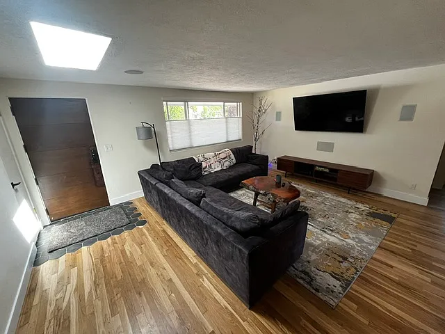 Livingroom with 65" TV and surround sound - 2415 W Palouse St