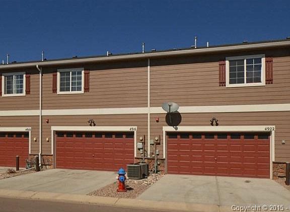 Two car garage with garage door opener and house bib faucet