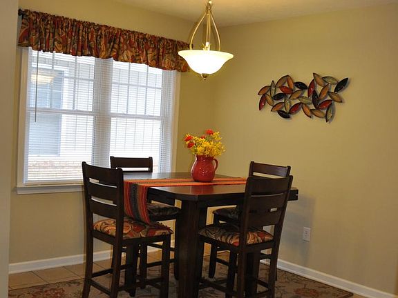 Dining area is bright and airy