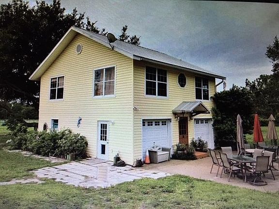 View fo the home from the barn - front of home can be used as a patio as well