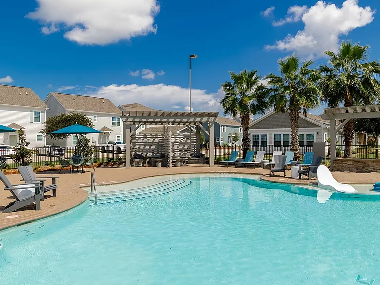 Unwind by the Resort-Style Pool with Shaded Seating at Seaglass Apartments - Luxury Living in Corpus Christi