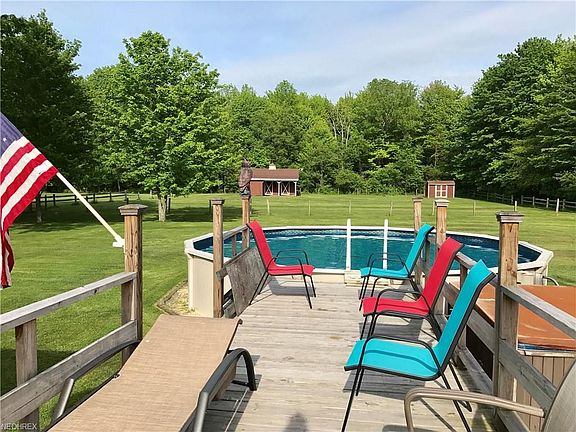 ABOVE GROUND POOL, TIERED DECKING, BARN, PADDOCK, HUGE UTILITY SHED,