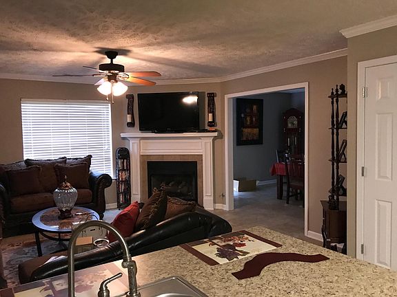 Kitchen to living room and dining room area. Gas Fireplace 