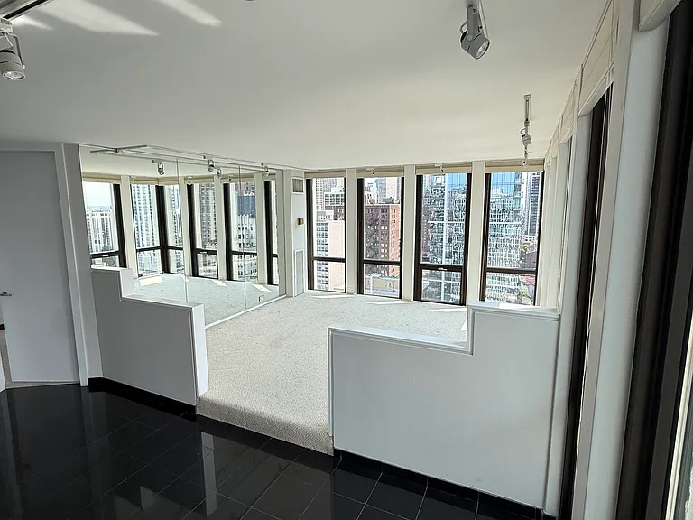 Full size wall mirror on left.