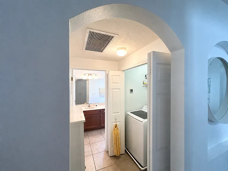 Laundry leading to half bath