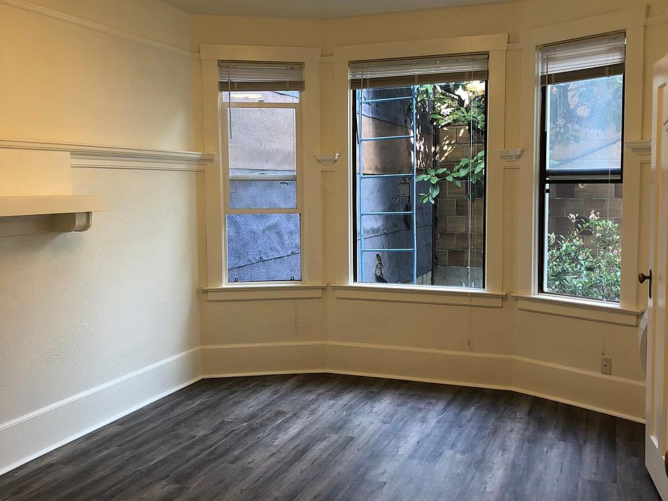 Large main room with closet and bay windows