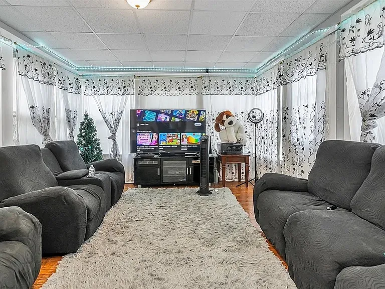 This unit also includes an additional living room space.