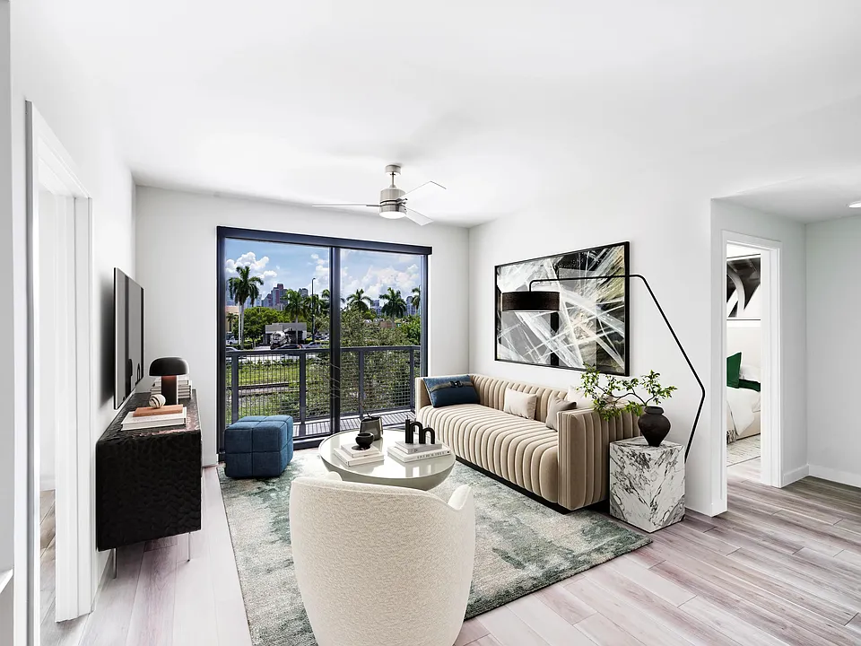 Stylish living spaces at Modera Aventura blend sleek design with views of Miami's tropical landscape.