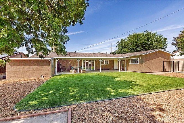 Expansive Park-Like Rear Yard w Fenced Dog Run and