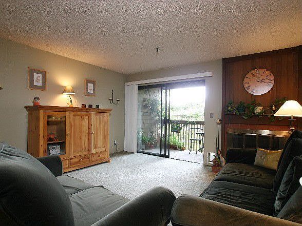 Living Room with tree-top views!