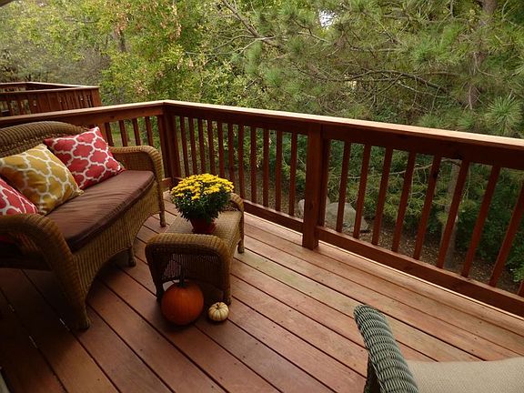 Deck with mature trees.