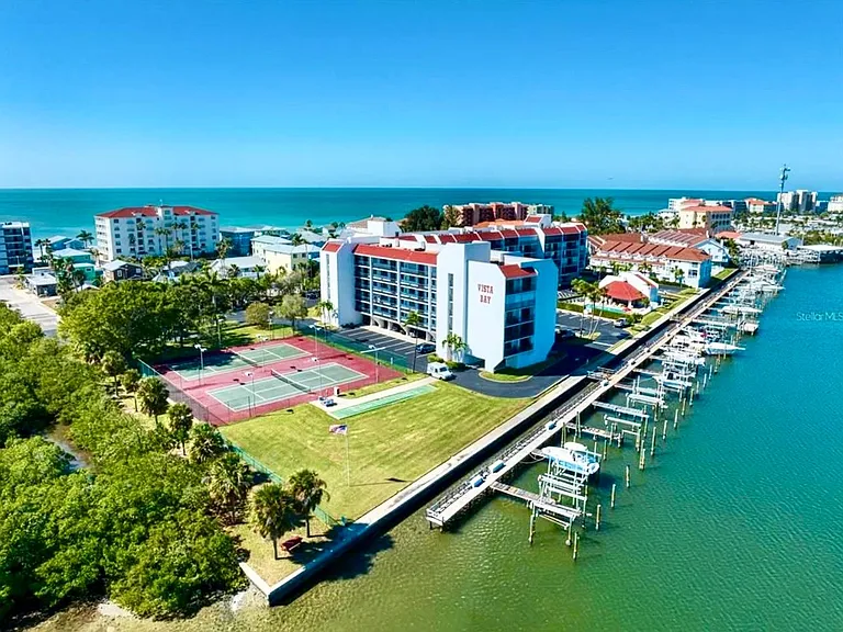 Vista Bay docks intercoastal with beach view in background