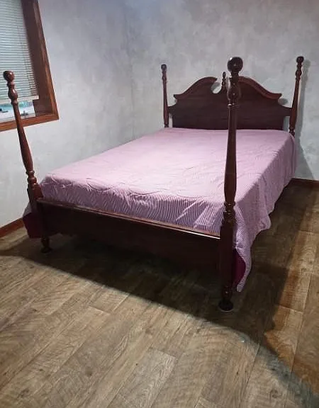 Lower level bedroom , new bed, box spring and mattress. New Vinyl flooring.