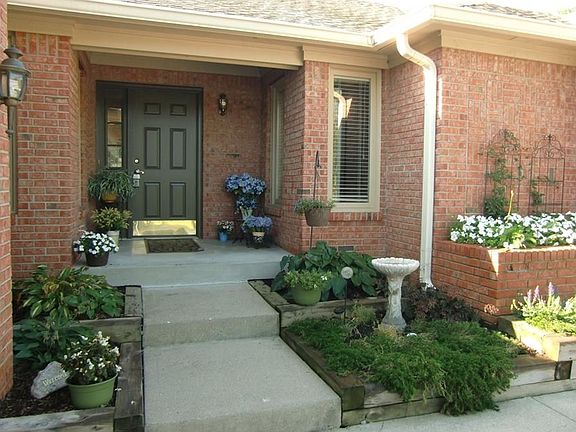 Beautiful entry.  Meticulous landscaping.