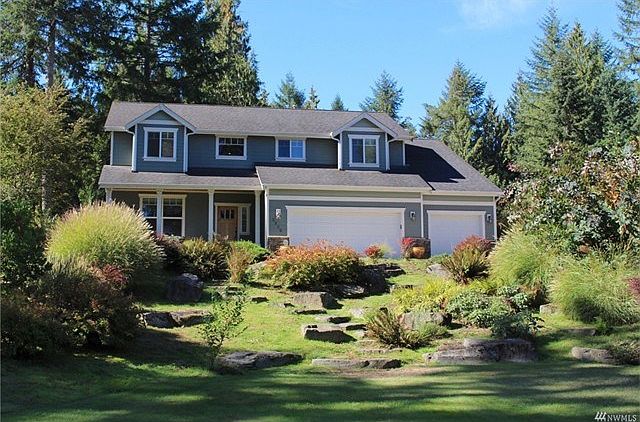Craftsman Style Custom Built Home on large lot with attention to detail with beautiful wood floors and painted trim package, granite slab counters, 9' ceilings and wood & wrought iron stair railing.