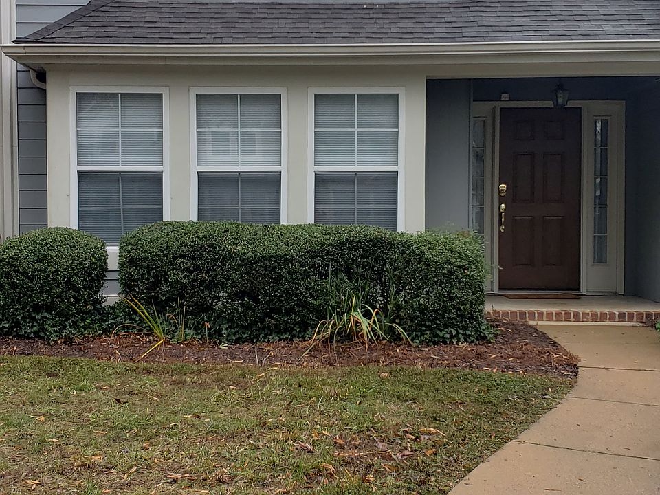 Front view from parking (2 assigned spaces).