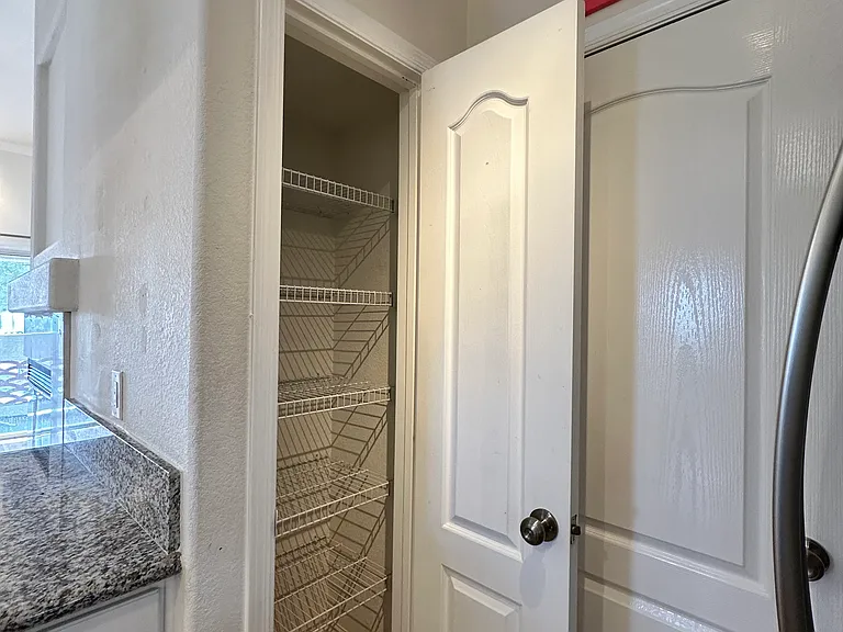 Efficient kitchen layout featuring a compact yet practical storage.