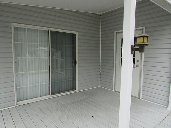 Covered side porch off the kitchen