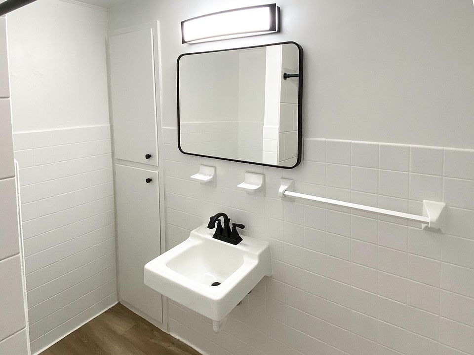 Updated light, mirror and faucet